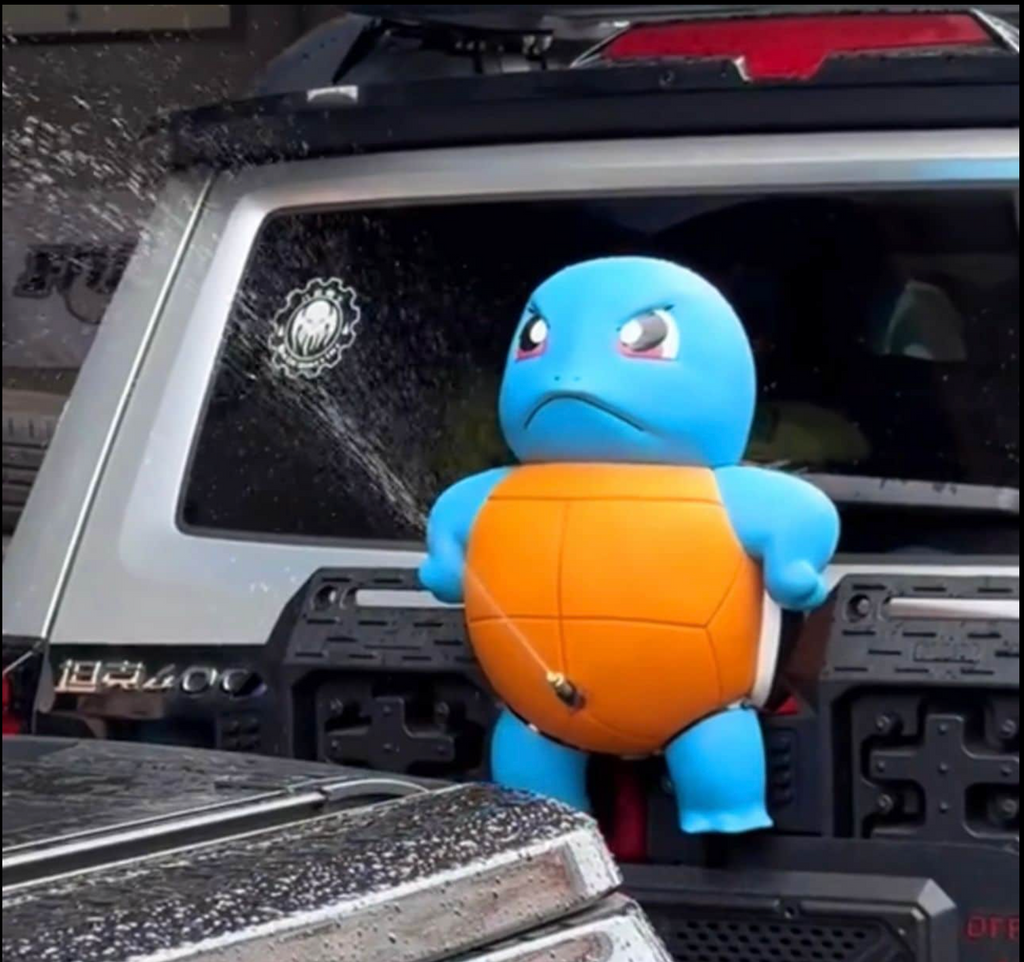 MUÑECO SQUIRTLE DE AGUA AUTOMATICO